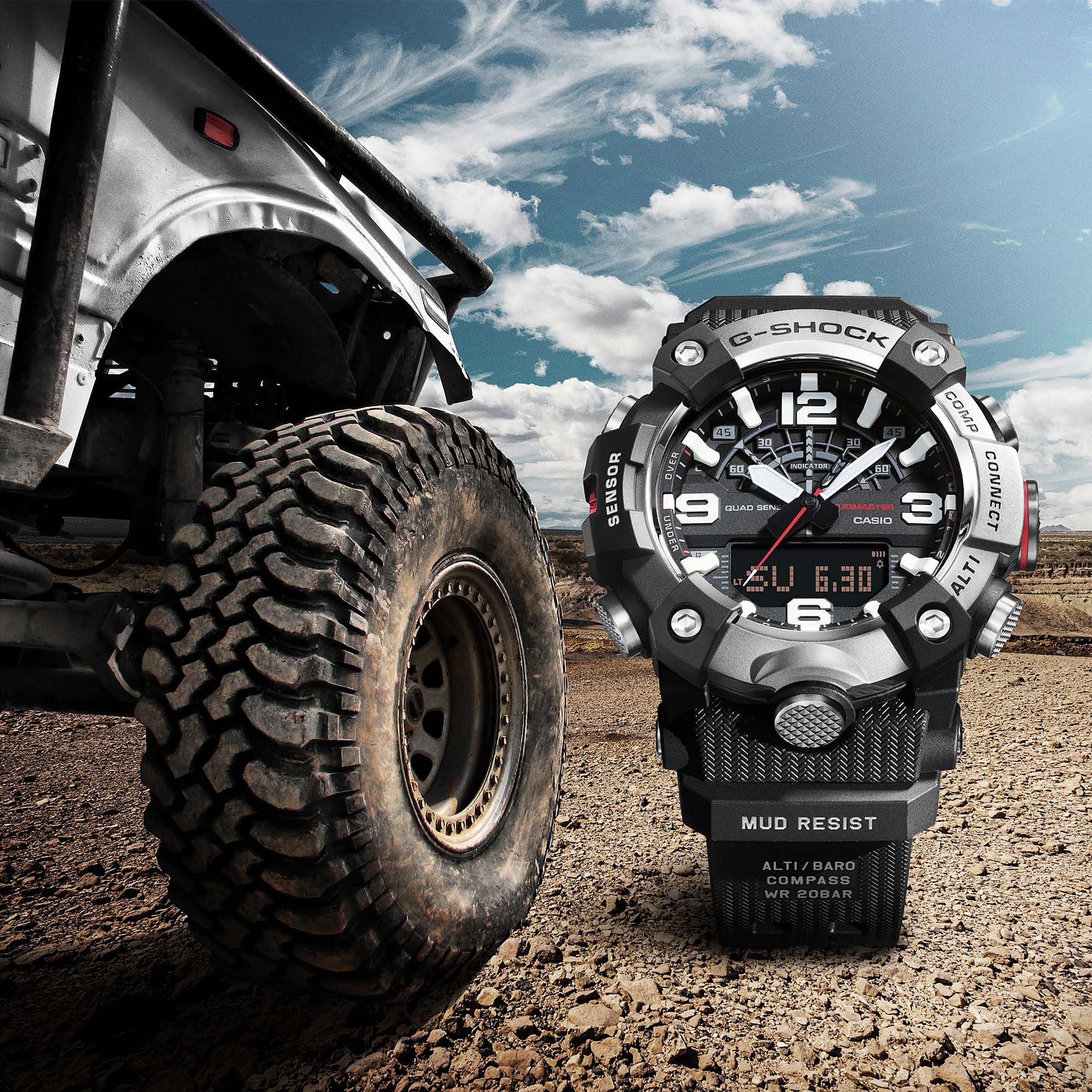 G-SHOCK Mudmaster GGB100XM-1A Analog Digital Watch in a desert scene.