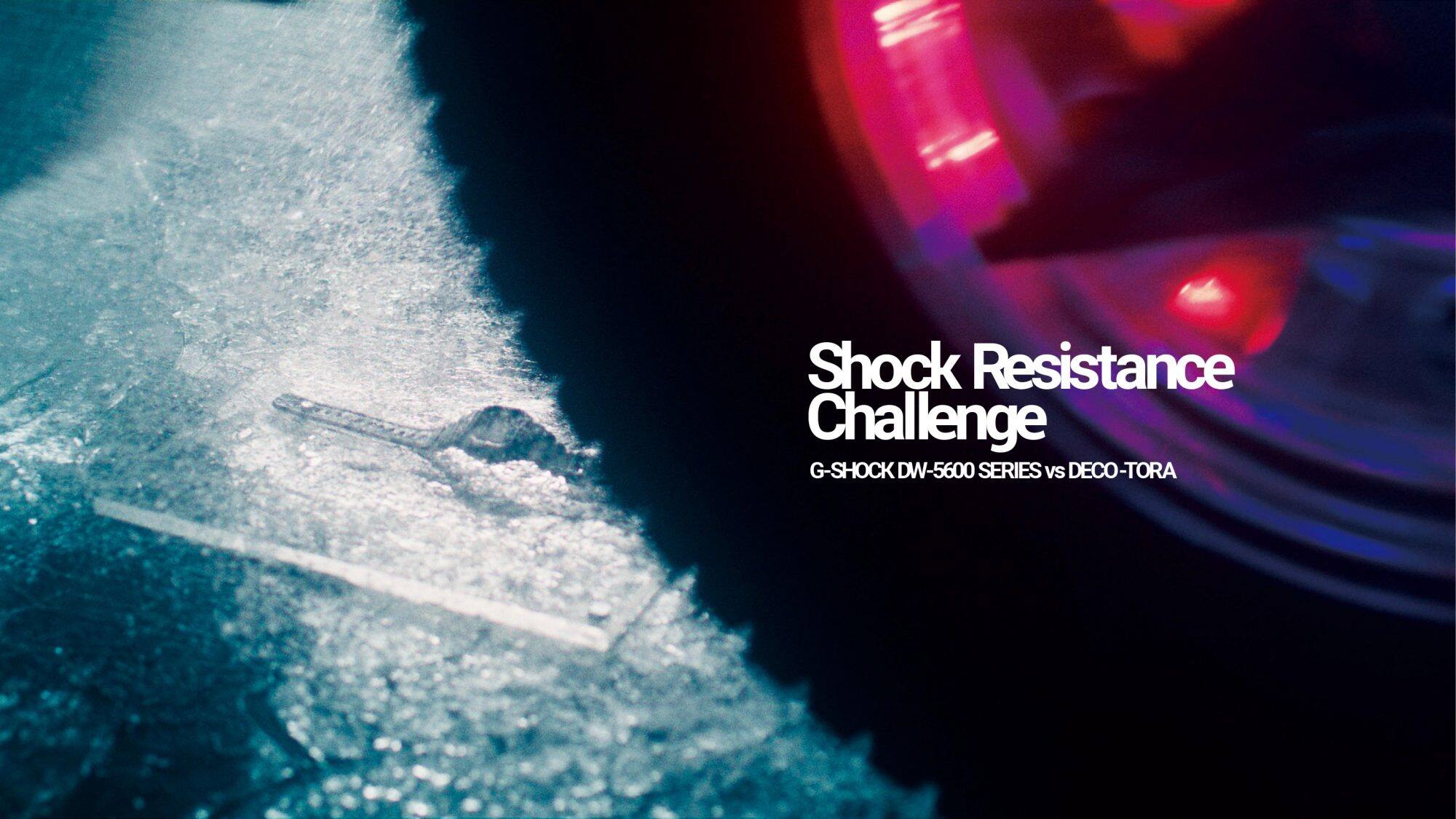 Shock Resistance Challenge: G-SHOCK DW-5600 SERIES vs. DECO-TORA, Im Hintergrund ist eine Nahaufnahme des Reifen und der G-SHOCK Armbanduhr zu sehen.