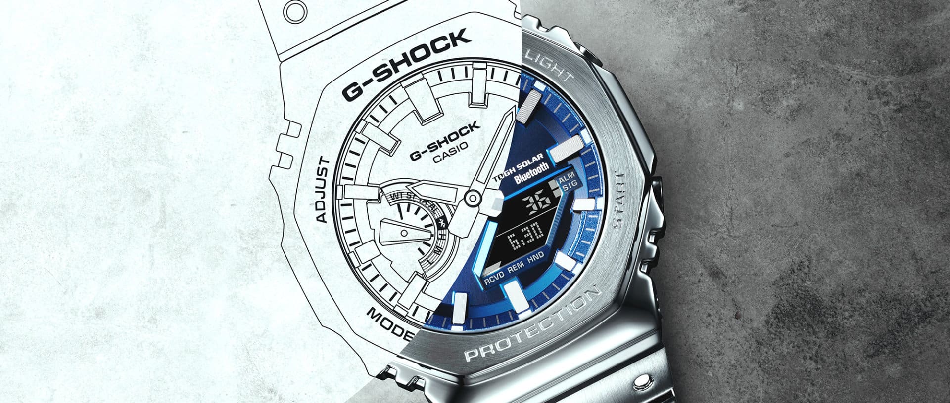 GM-B2100 with a blue bezel an a silver band 