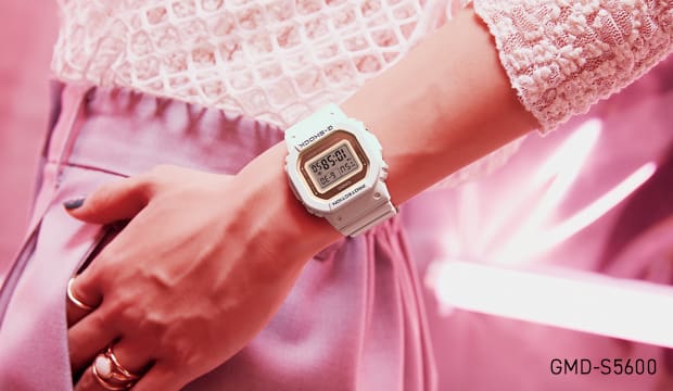 White G-SHOCK GMD-S5600 digital watch in a pink environment White G-SHOCK GMD-S5600 digital watch in a pink environment