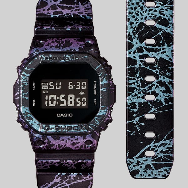 G-SHOCK black DW5600 digital watch with purple and blue decorated band DW-5600PM-1