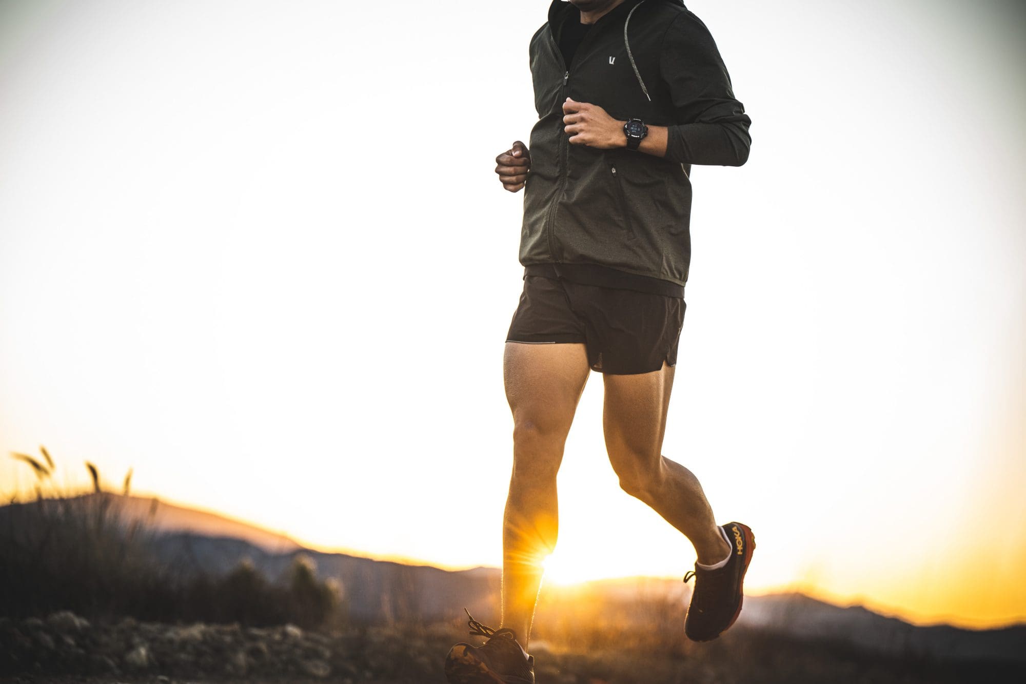 man wearing black G-SHOCK MOVE GBDH2000-1A running on a trail man wearing black G-SHOCK MOVE GBDH2000-1A running on a trail
