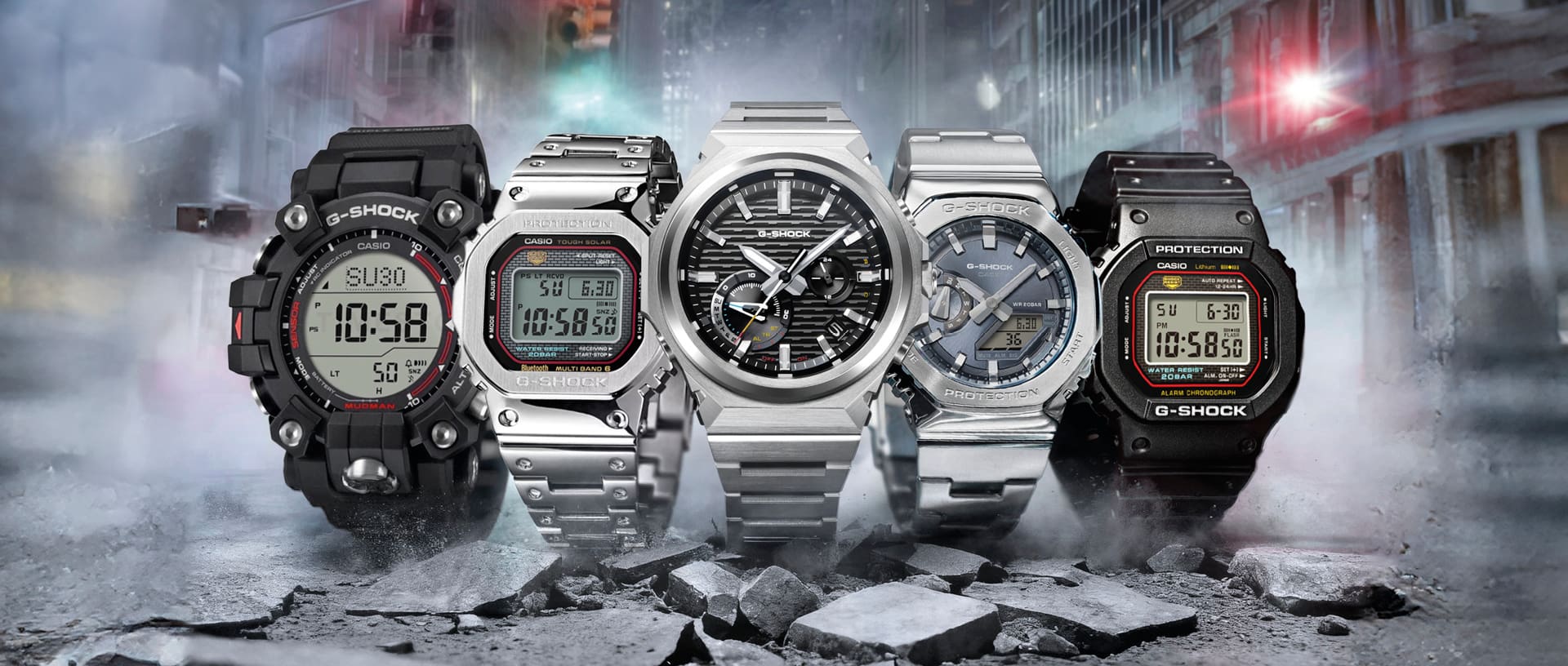 G-SHOCK con fondo azul ahumado y rojo sobre piedras. De izquierda a derecha: GW-9500, DW-5600, GMA-2100, GMC-2110 y DW-5600