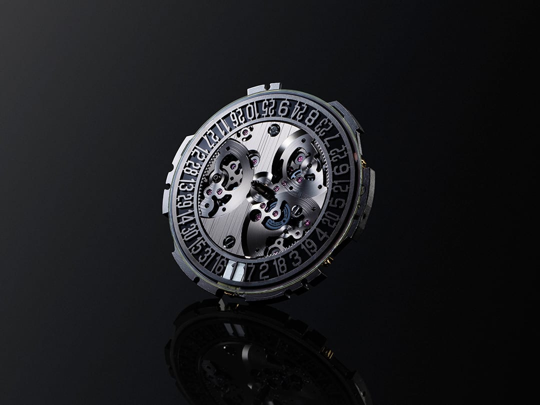 The round, silver dial of the G-SHOCK G-D001 with its numerals and a view of the movement.
