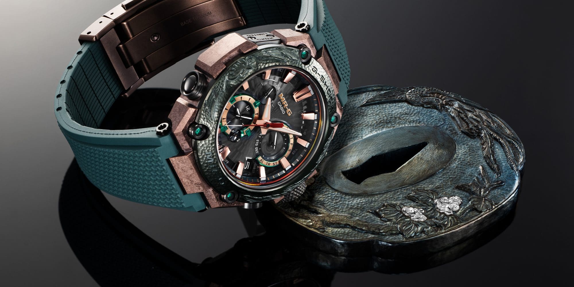 The G-SHOCK wristwatch MRG-B2000KT with a grey-green band and a massive copper case and an analogue display