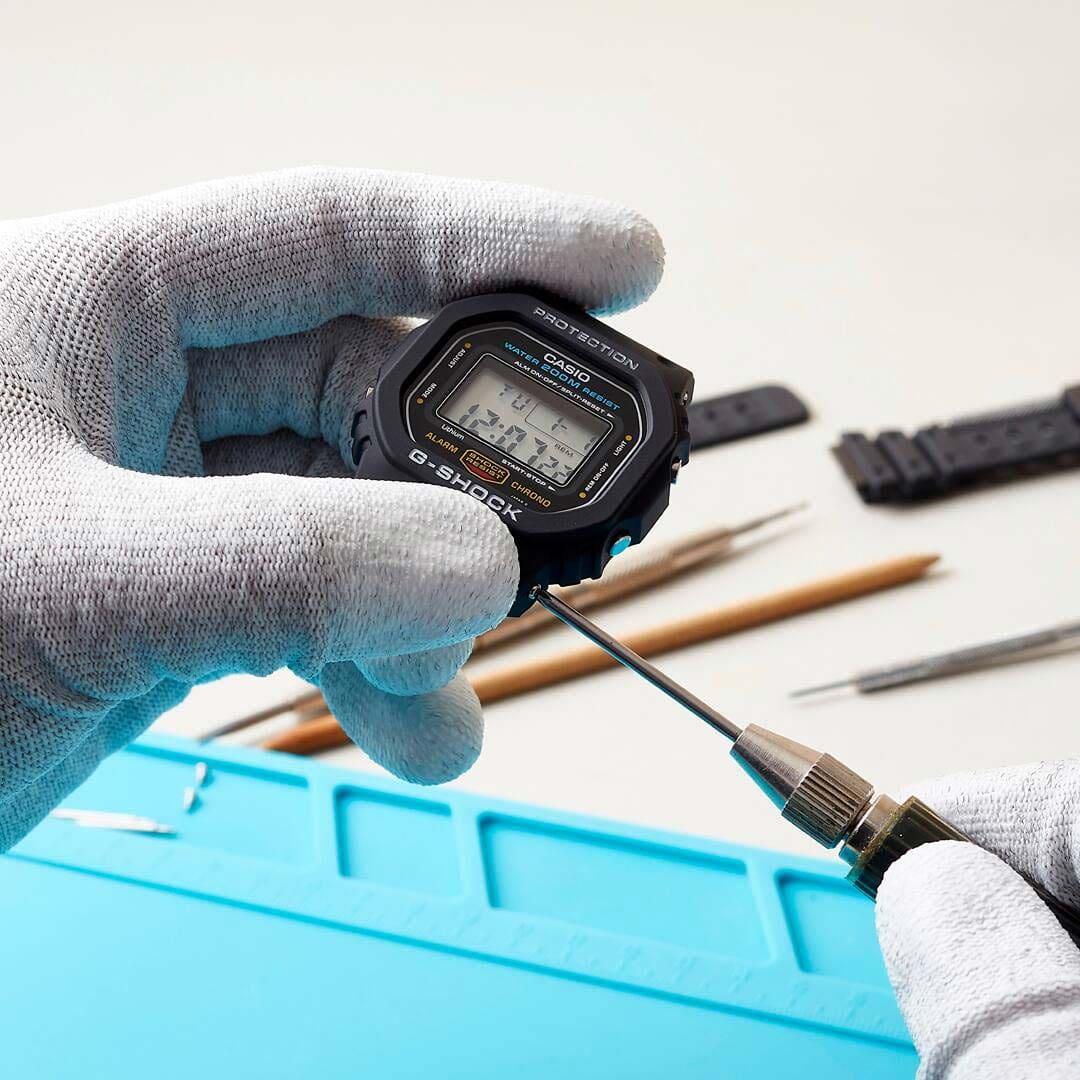 restorer updating the lock case screws