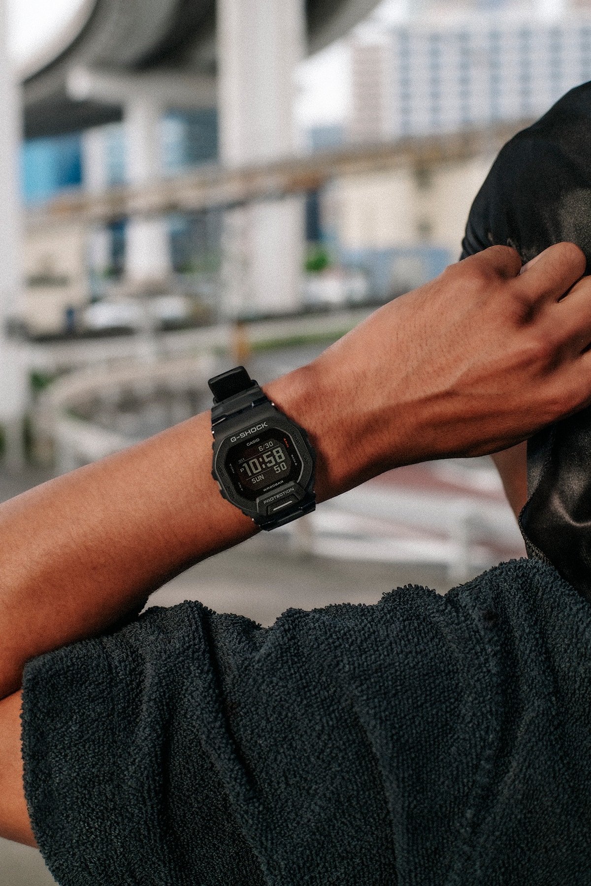 A man wearing a G-SHOCK GBD-200 watch on his wrist.