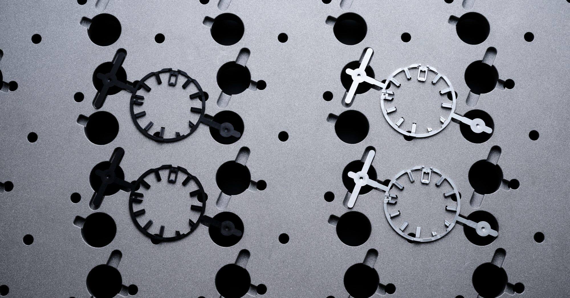 Applying sputtering finishes to indexes and other components