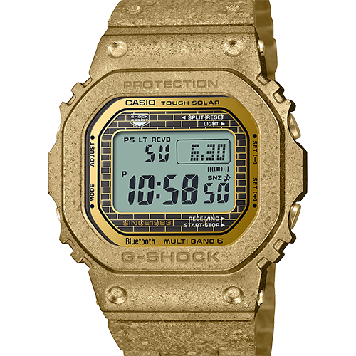 Vista frontale del GMW-B5000PG-9 della serie Recrystallised, con cassa e bracciale scintillanti in oro e display digitale luminoso.