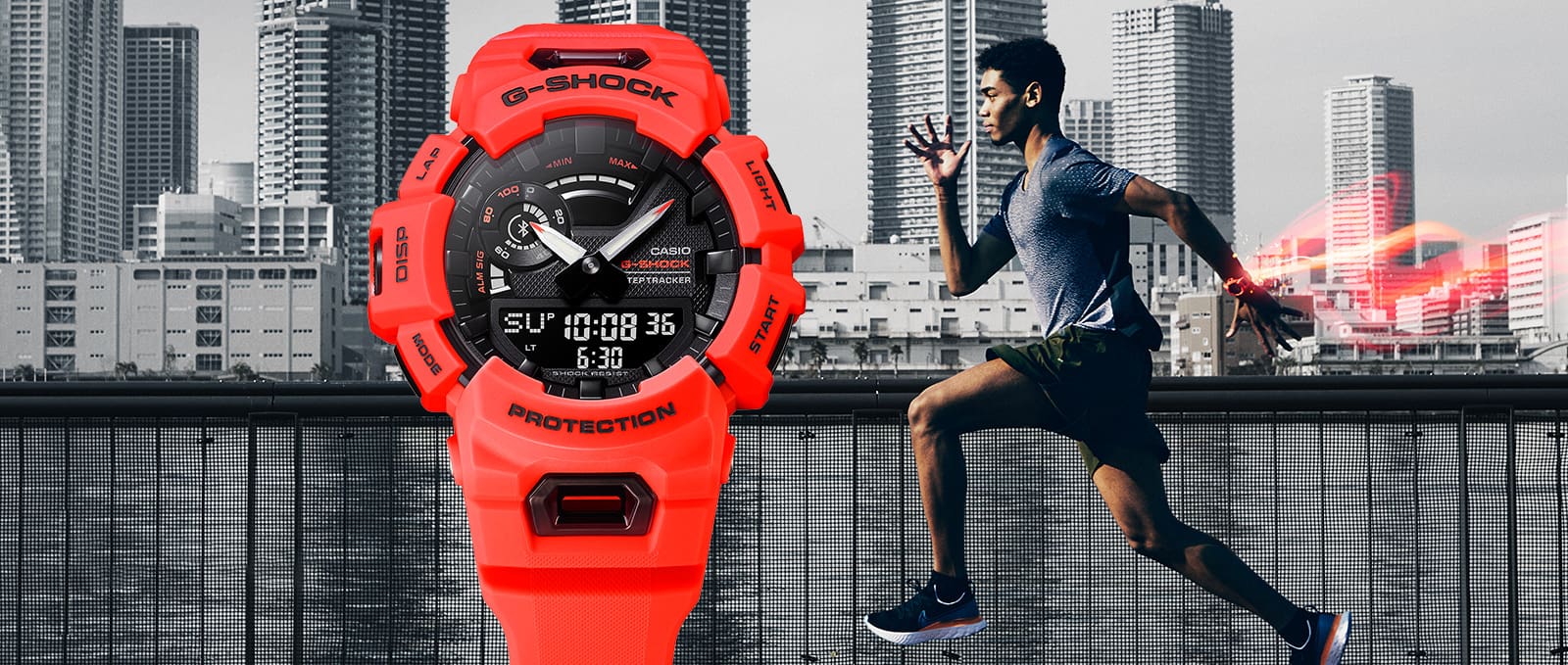 GBA-900 red analog digital watch in a scene with sprinting runner with speed effect trailing behind