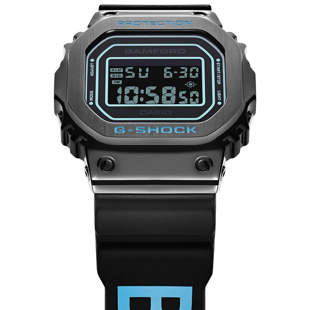 the GM-5600 and its distinctive metal bezel in all black as our base, featuring Bamford’s signature aqua blue throughout the design. 
