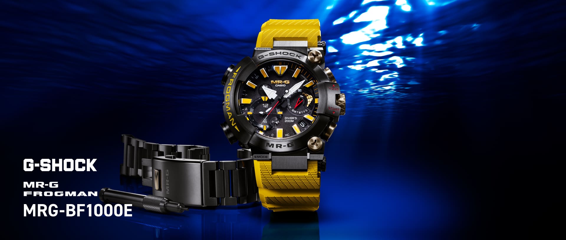 MR-G Frogman MRG-BF1000E-1A9 met ronde, robuuste kast, analoge display en gele kunststof band. Er is ook een verwisselbare grijze metalen band.