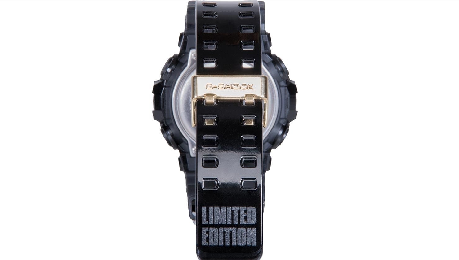 Verso do relógio de pulso preto e dourado da No Comply e G-SHOCK