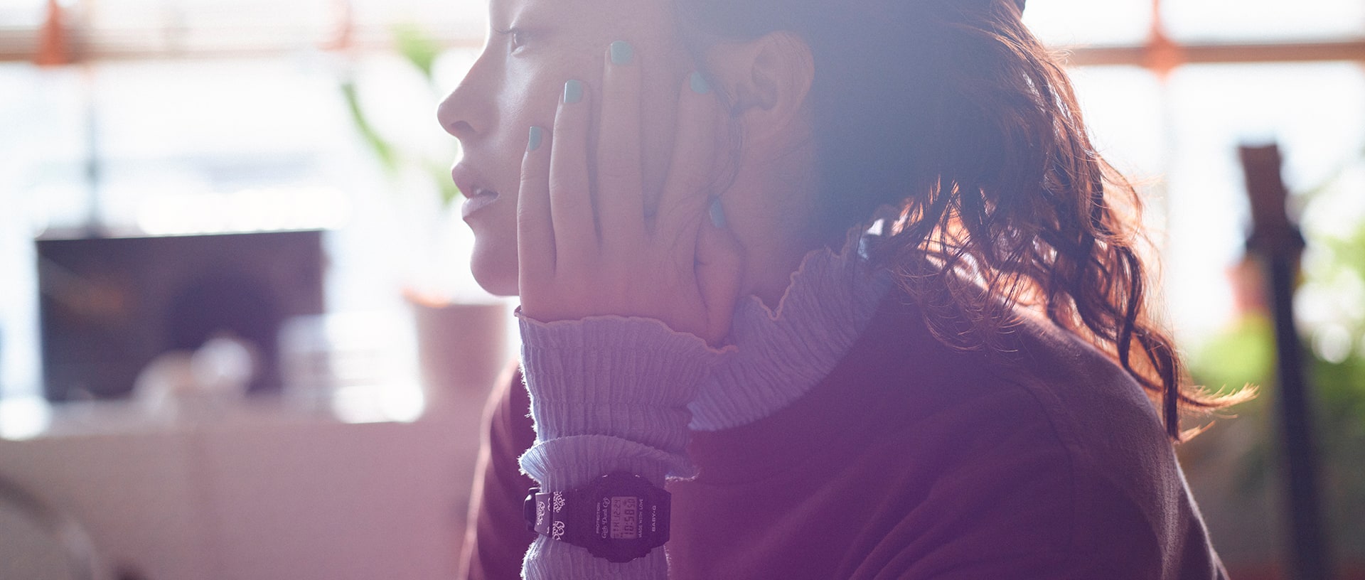 G-SHOCK x VERDY Girls Don't Cry collaboration. A close-up of a female model's profile and the G-SHOCK watch on her wrist.
