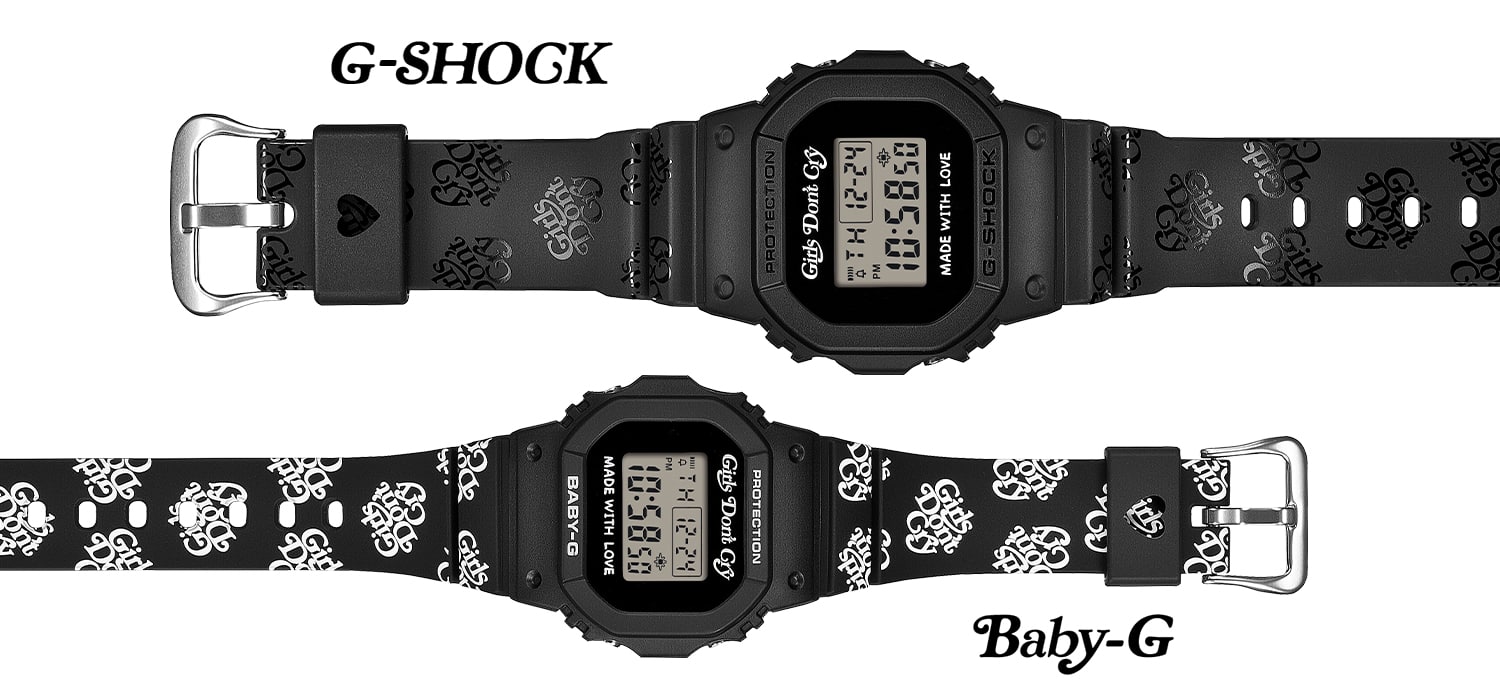 Girls Don't Cry iş birliğine ait G-SHOCK ve BABY-G modellerinin (LOV-26A-1) açık bir şekilde yerleştirilmiş görseli. Girls Don't Cry logolarını taşıyan kordonun tamamı ve kordon halkası üzerindeki kalp simgesi gösteriliyor.