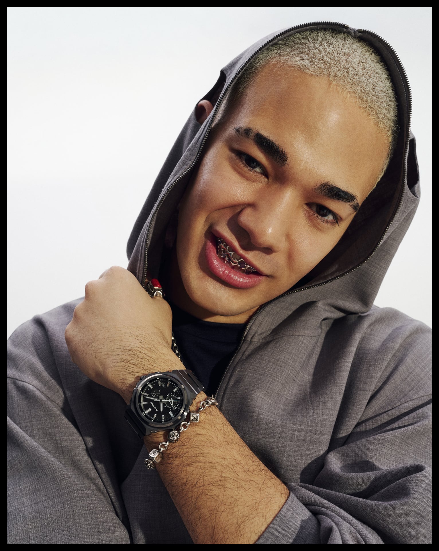 A photo of a man posing while wearing the GST-B1000BD-1