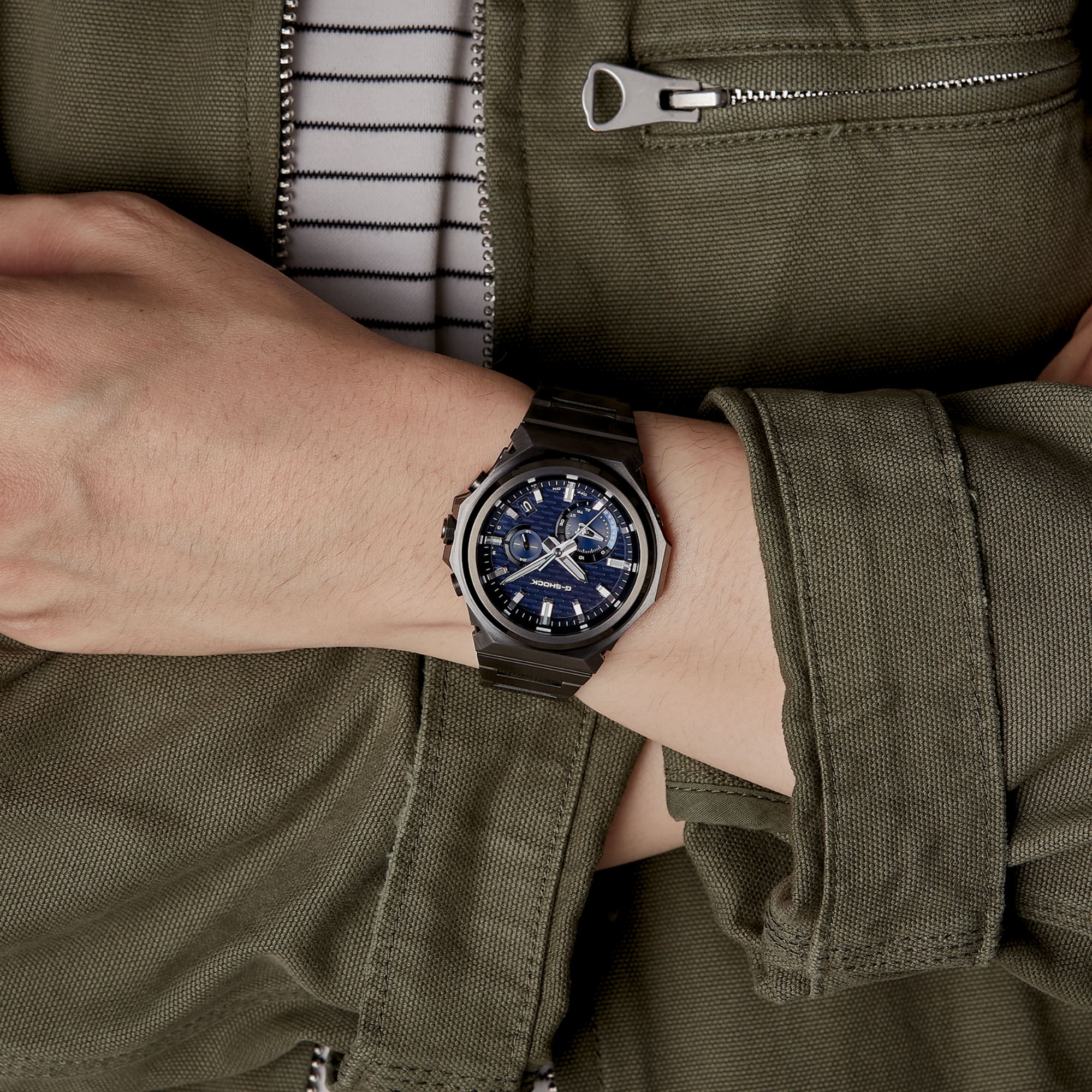 A photo of a man posing while wearing the GST-B1000BD-2