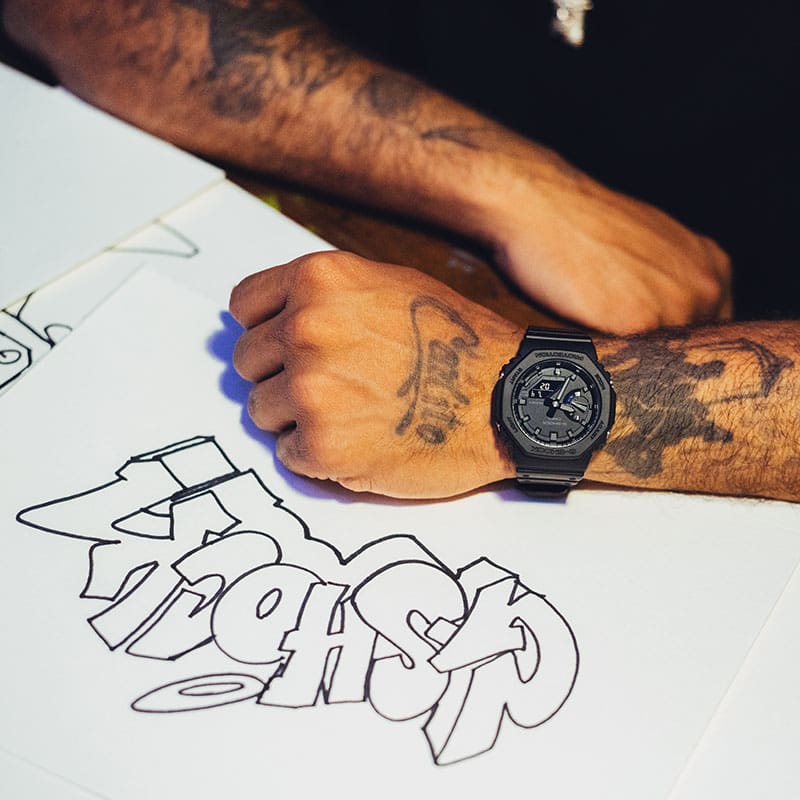 Charles Doves wearing G-SHOCK GA-2100-1A1 Black Analog Digital Watch