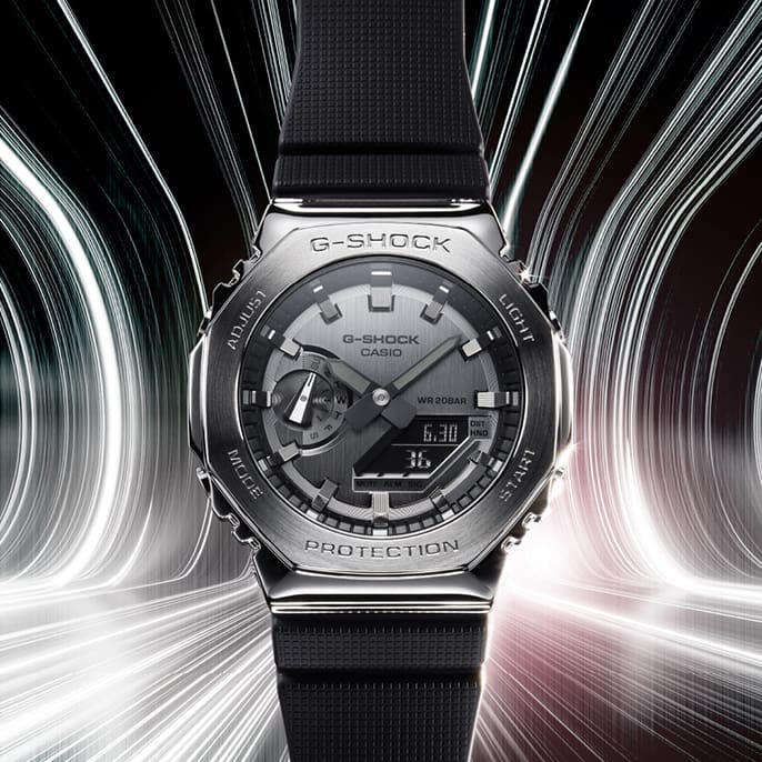 GM2100 watch with silver face and black band