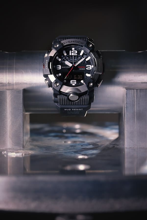 Close up of the G-SHOCK GGB100XM-1A mil-spec watch undergoing the MIL-STD-810 random vibration test denoting toughness.
