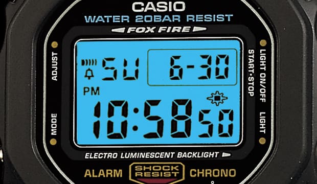 Close up of G-SHOCK 5000/5600 series watch with blue EL backlight.