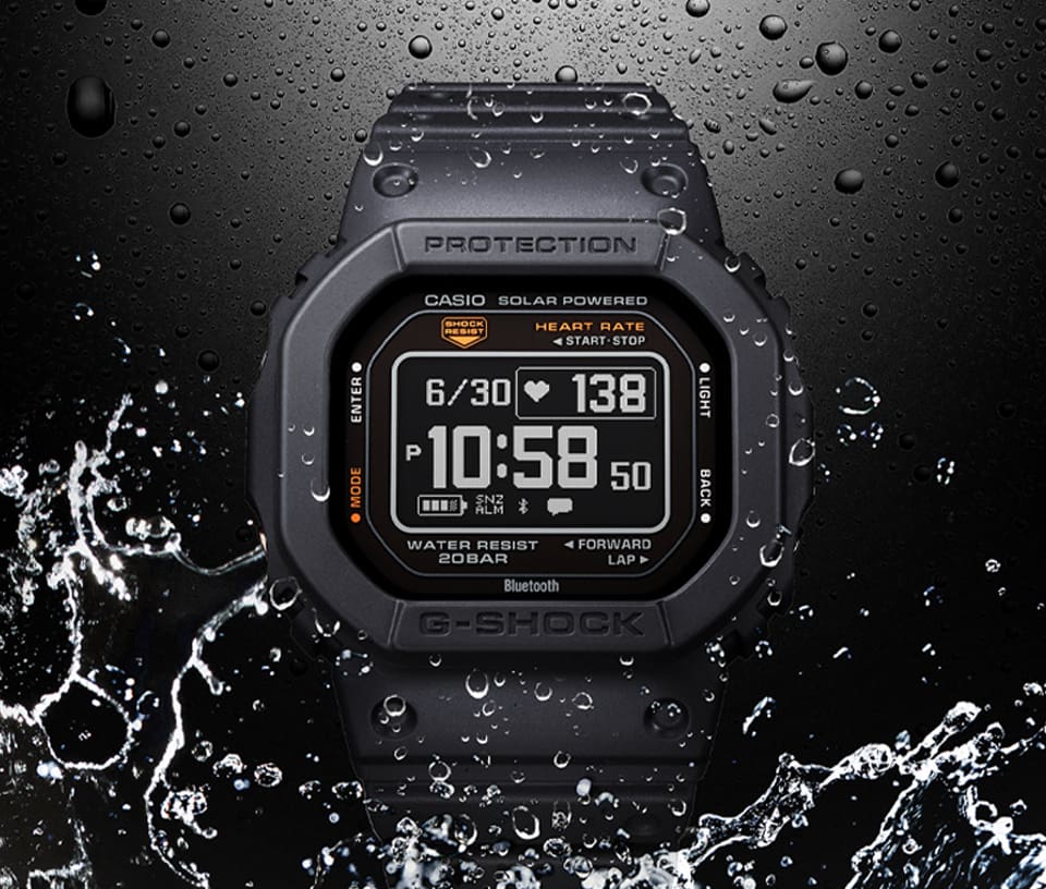 G-SHOCK DWH5600 digital watch amidst a splash of water denoting water resistance.
