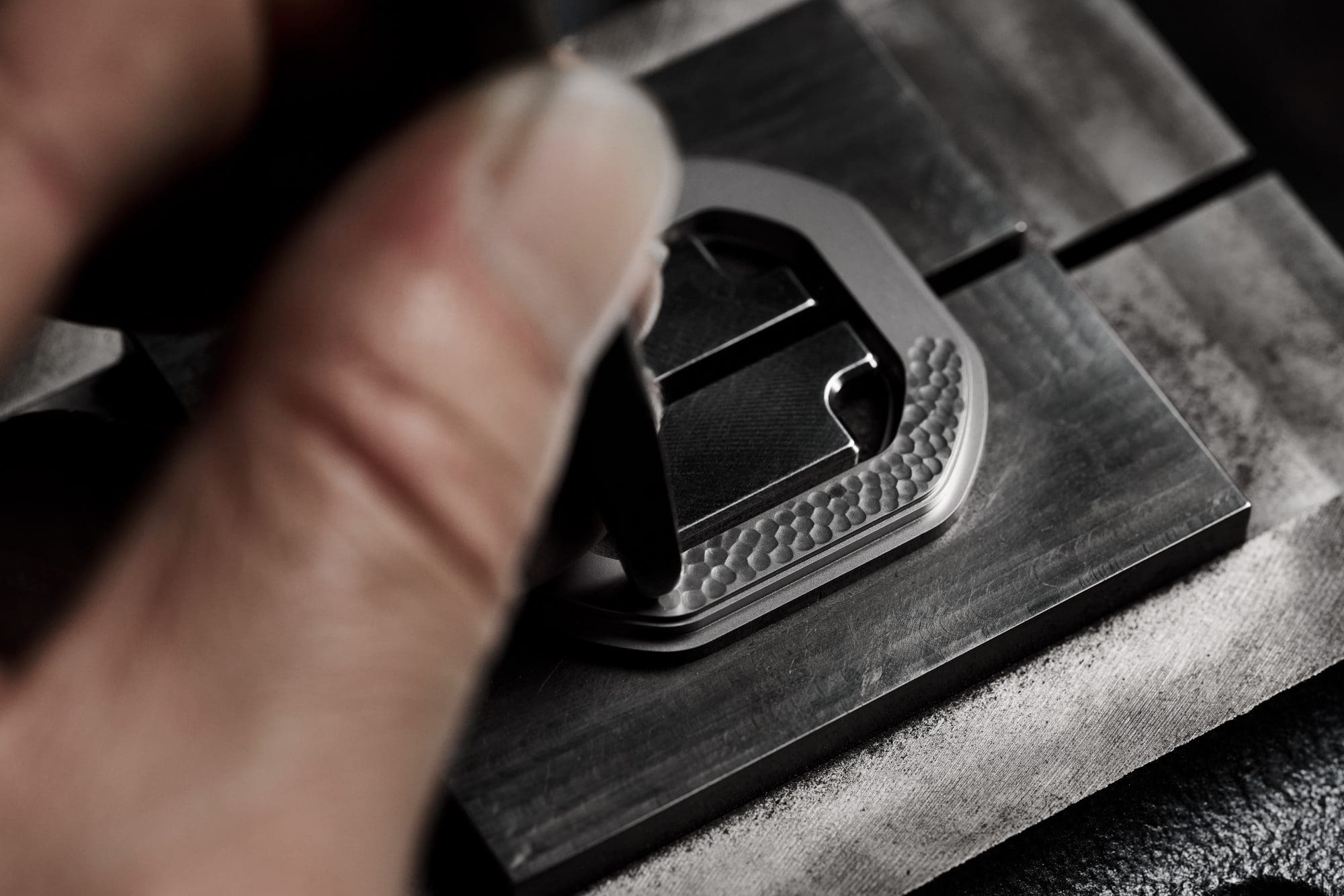 Photo showing hammering process being applied to a watch bezel