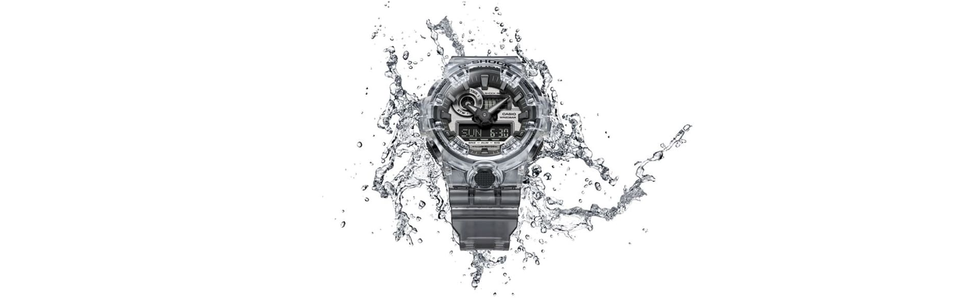 G-SHOCK GA-700SKE-7A waterproof watch splashed with water denoting water resistance.