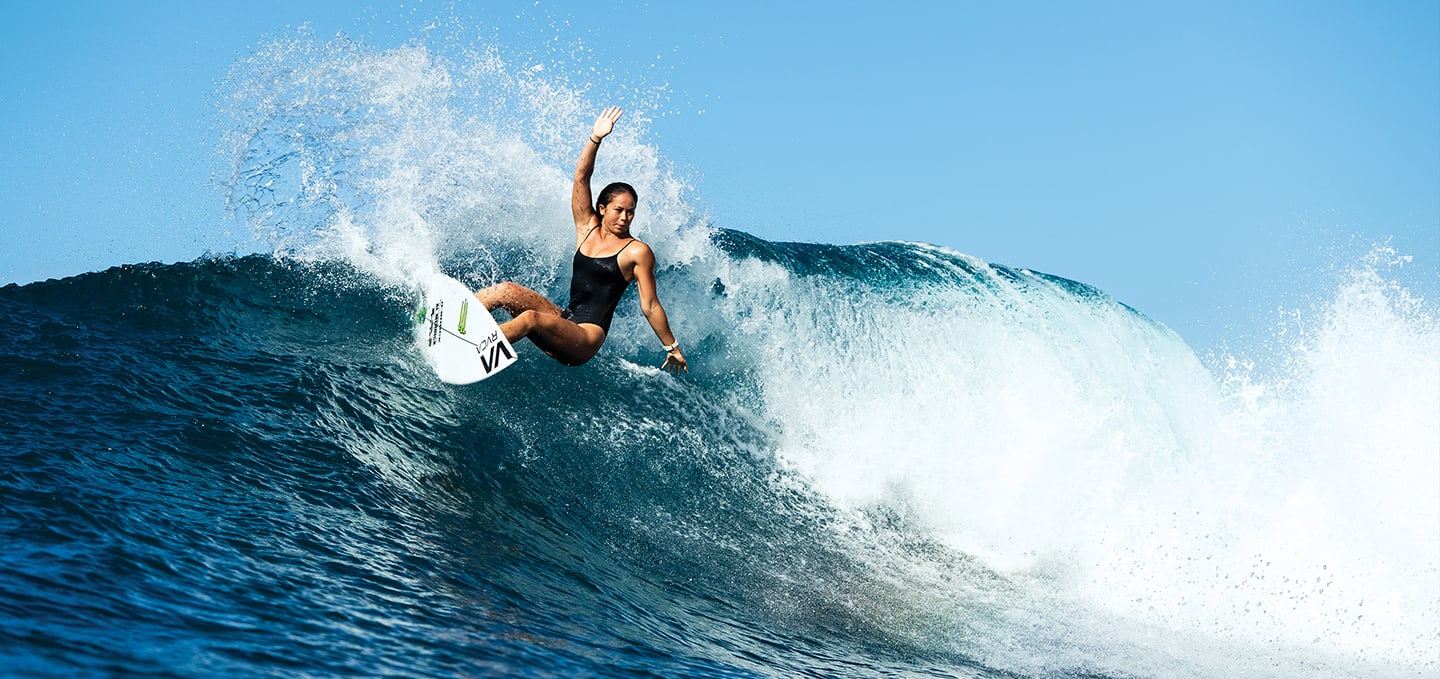 Betty Lou Sakura Johnson surfing a big wave