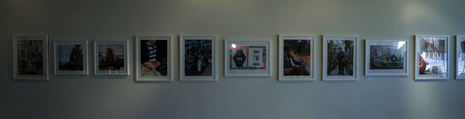 A photo of multiple visuals from THISTIME magazine No. 2 hanging on the wall