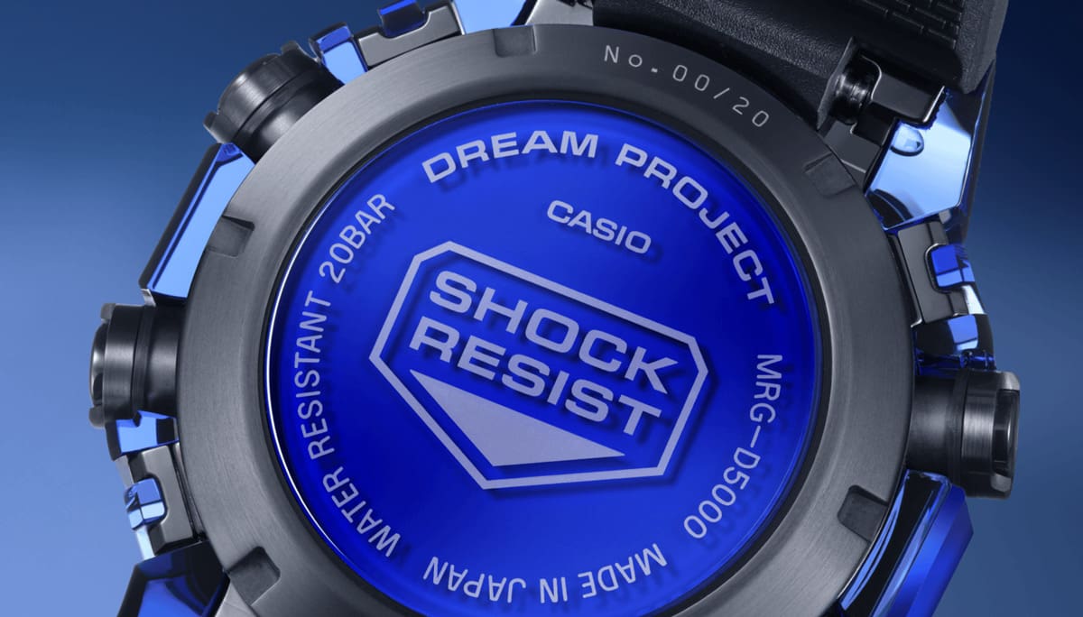 Blue and black MR-G caseback with Shock Resist markings.
