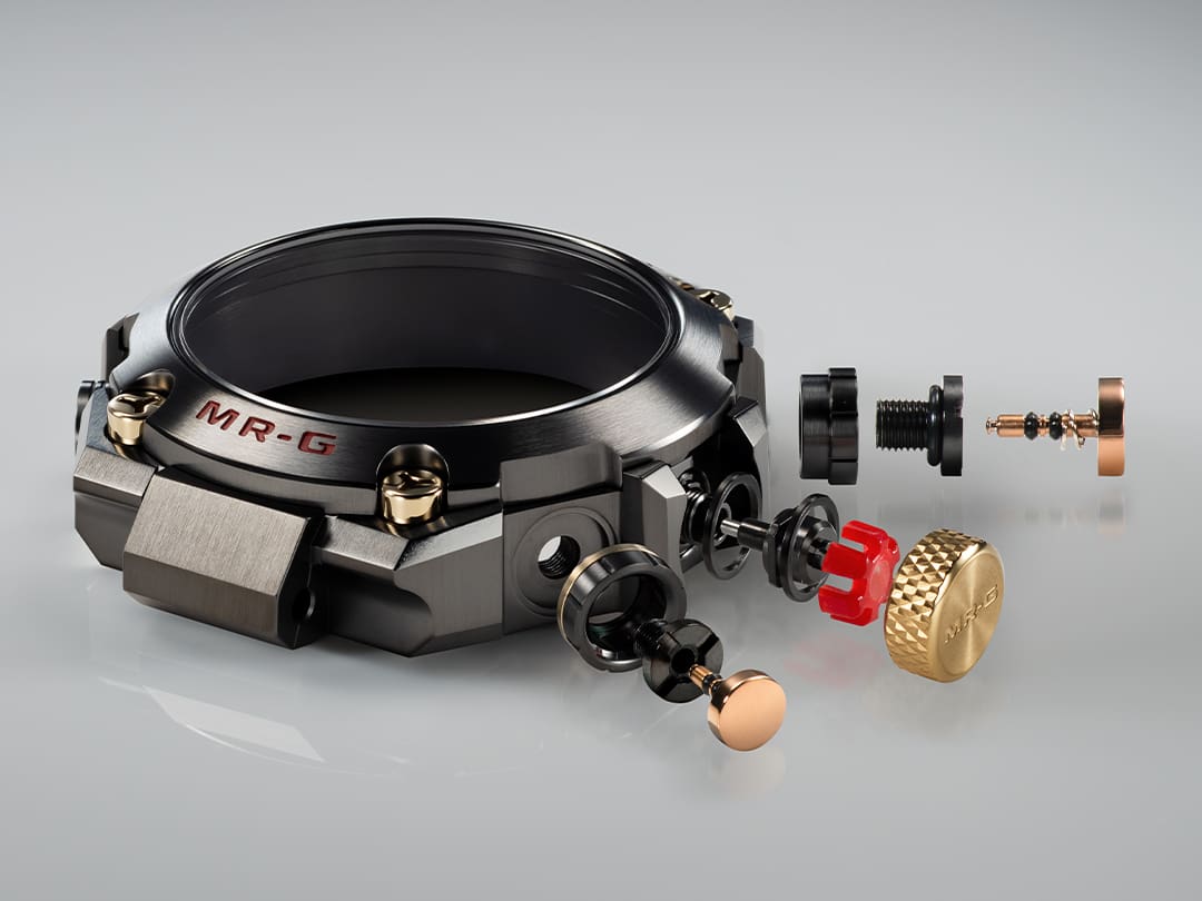 Einzelteile der MRG-B2000SG-1A: Krone, Tasten, Schrauben und Pufferteile 