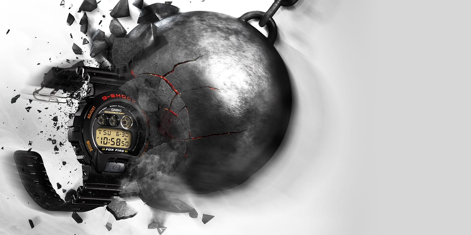 Eine Abrissbirne zerschellt an einer G-Shock DW-6900B-9 Armbanduhr, die unversehrt bleibt