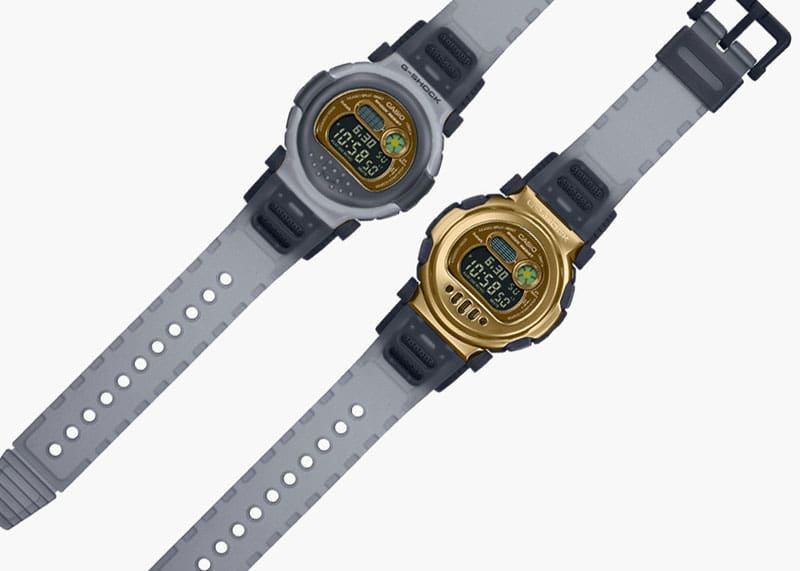 Die zwei Designs der Casio G-Shock G-B001MVB Armbanduhr nebeneinander: einmal mit grau-transparenter Urethan-Lünette und einmal ohne, so dass die goldfarbene Metalllünette sichtbar ist
