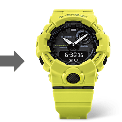 Ein grauer Pfeil weist nach rechts auf die gelbe Casio G-Squad GBA-800-9A Laufuhr mit schwarzem Zifferblatt