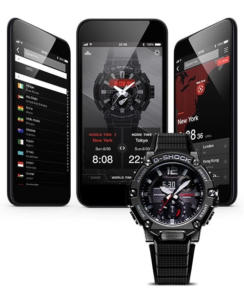 Drei Smartphones mit verschiedenen G-Shock-Connected-App-Screens, davor eine schwarze Casio G-Steel GST-B200 Armbanduhr