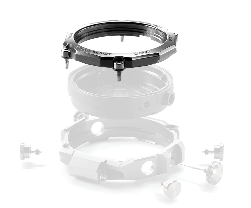 Einzelkomponenten des Gehäuse der MTG-B2000 Armbanduhr mit Fokus auf der Metallünette