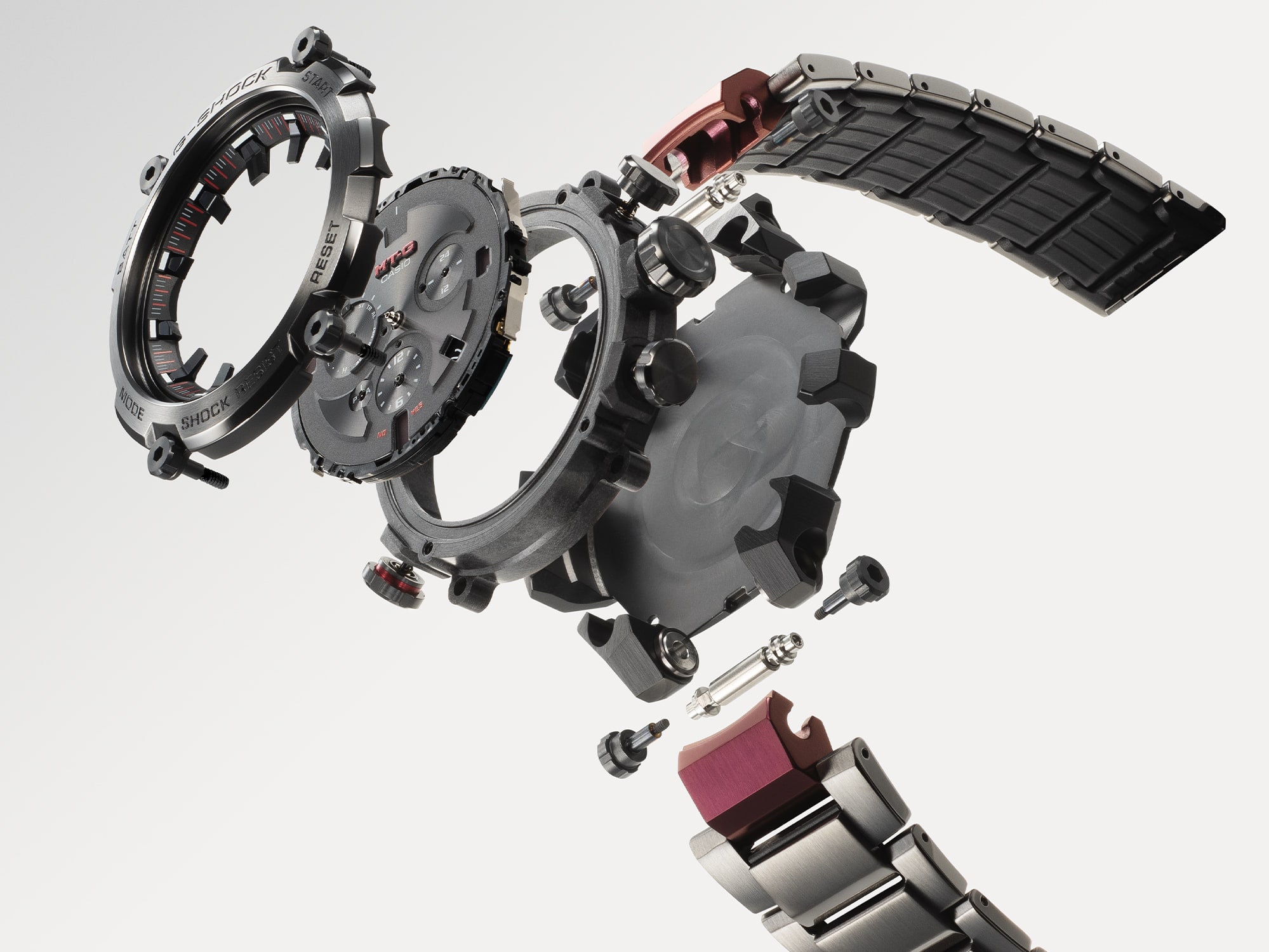 Einzelne Bestandteile der MTG Armbanduhr voreinander aufgegliedert