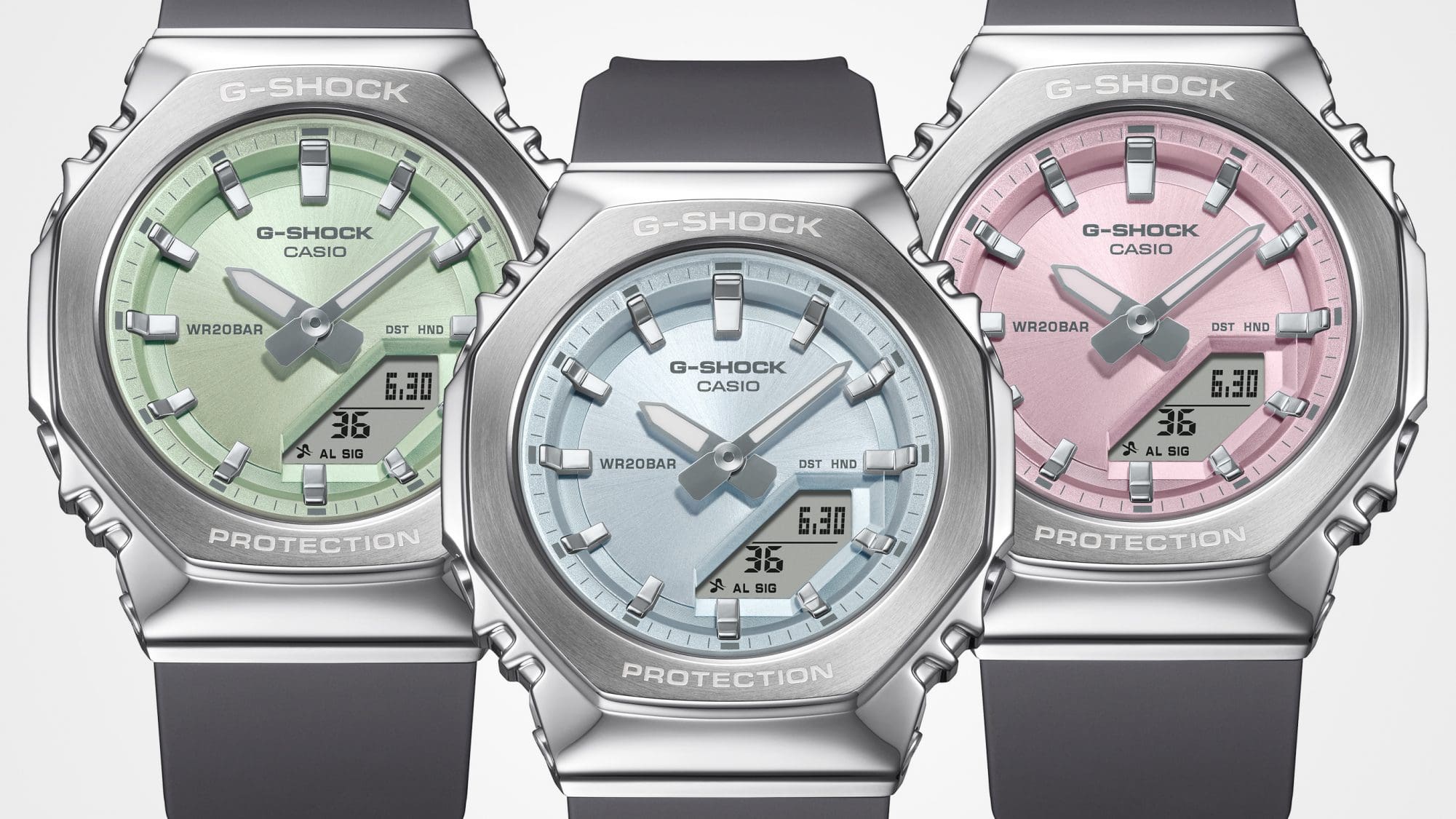 Von links nach rechts: GM-S2110-3A, GM-S2110-2A, GM-S2110-4A Die drei Farbvarianten der GM-S2110 Hybrid-Uhr nebeneinander: Die GM-S2110-3A mit grünem Zifferblatt, die GM-S2110-2A mit blauem Zifferblatt und die GM-S2110-4A mit rosanem Zifferblatt
