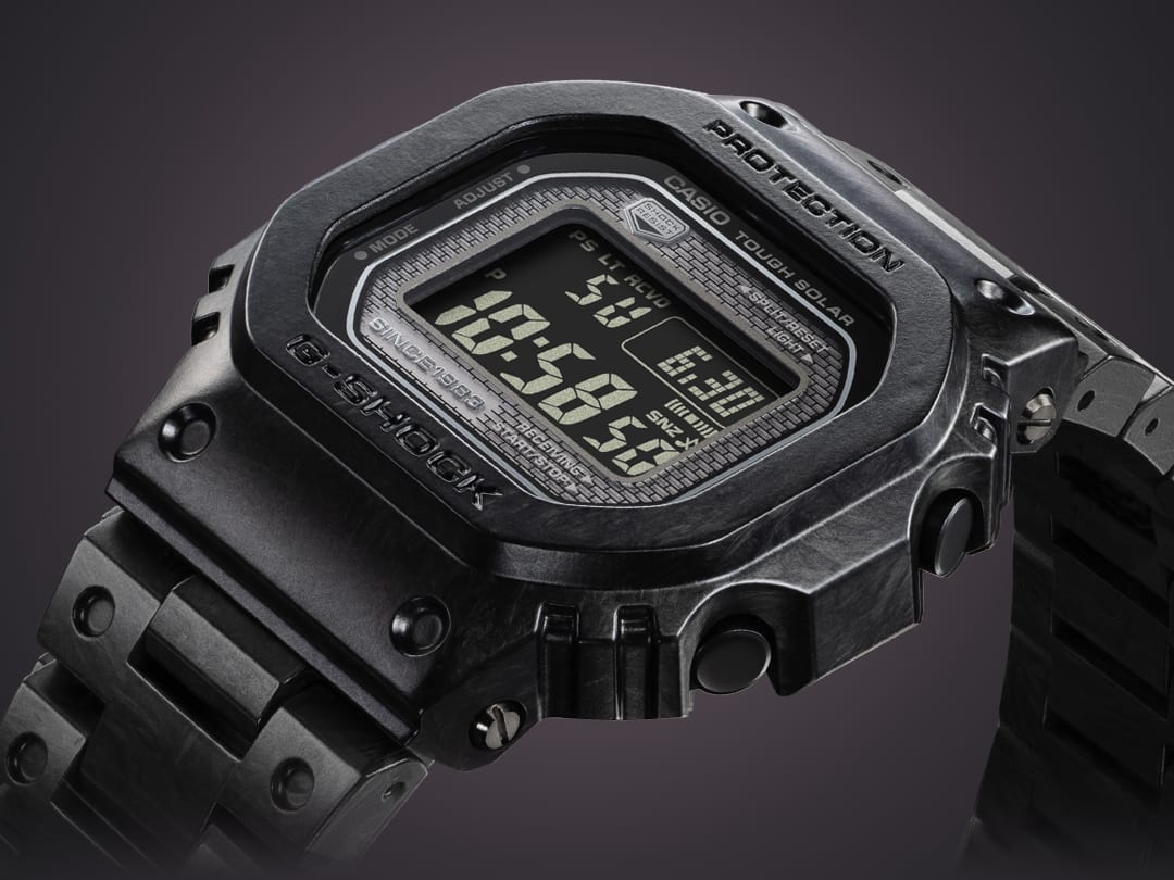 Side view of the display and case of the black and grey Casio G-Shock GCW-B5000UN-1 digital watch