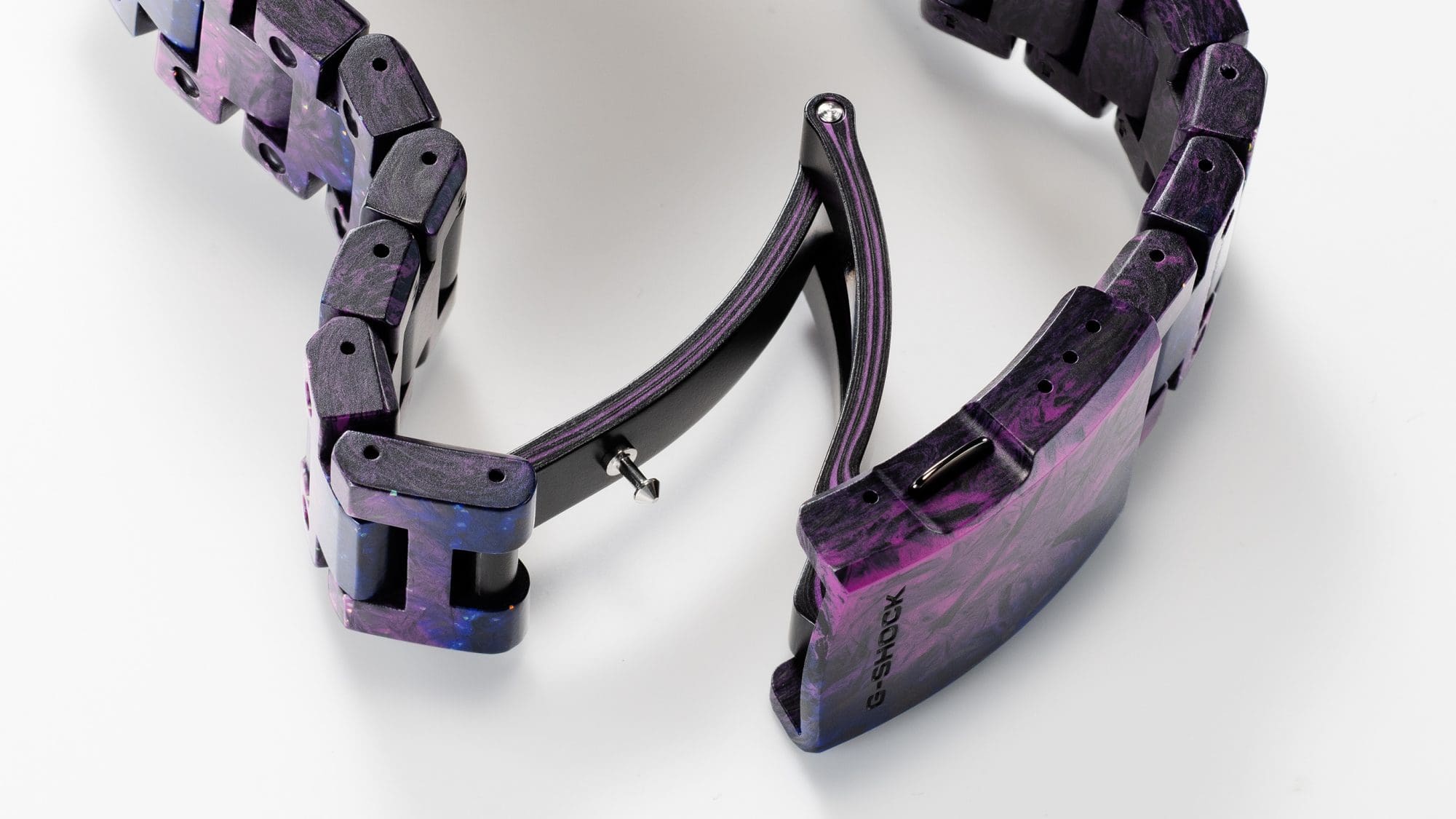 The triple-folding one-touch clasp of the black, blue and pink GCW-B5000UN-6 wristwatch