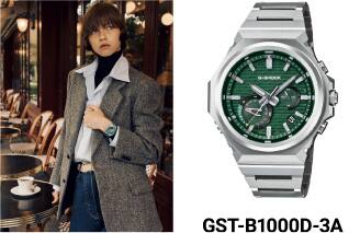A model on the left wearing a lightblue blouse and a grey jacket in front of a café; a productshot on the right of the metal wristwatch GST-B1000D-3A with a darkgreen analogue bezel. The image links to the product page.