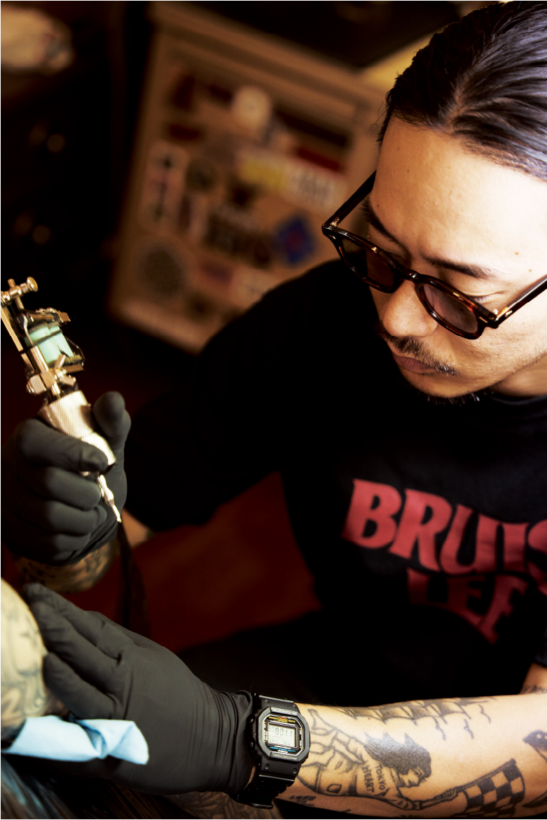 Close-up of Len Yamada while working.