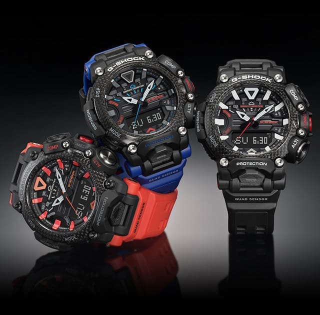 Three Gravitymaster GR-B200 models: one wristwatch with a red strap, one with a blue strap and one with a black strap