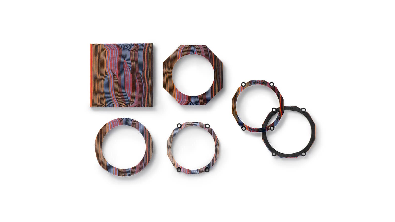 Individual components of the G-SHOCK MTG watch with grain in rainbow colours