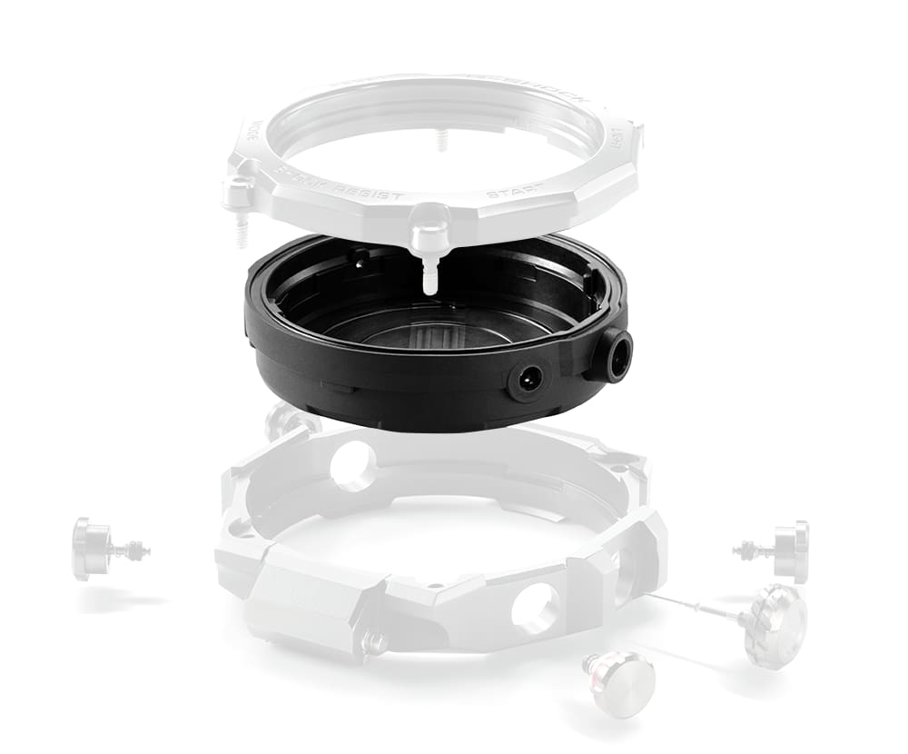 Individual components of the MTG-B2000 wristwatch case with focus on the carbon centre section