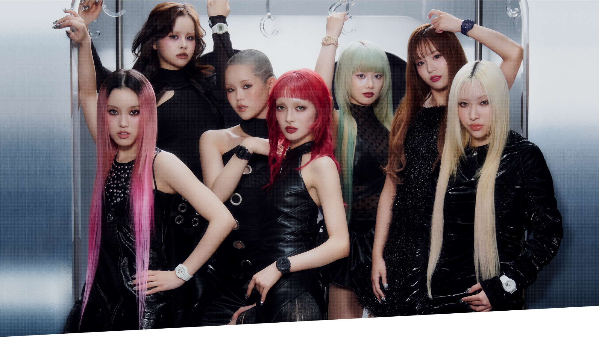A photo of XG members wearing G-SHOCK.