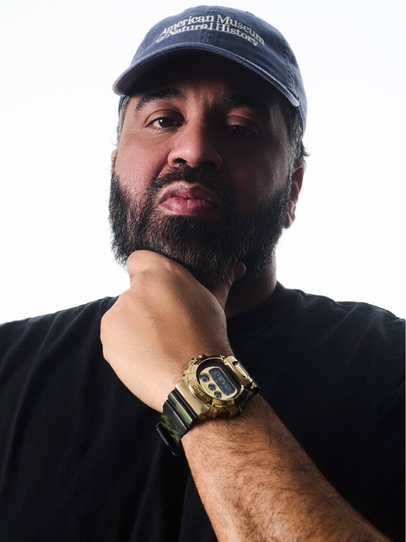 A male is wearing G-SHOCK GM-6900CMG-3 on his wrist.