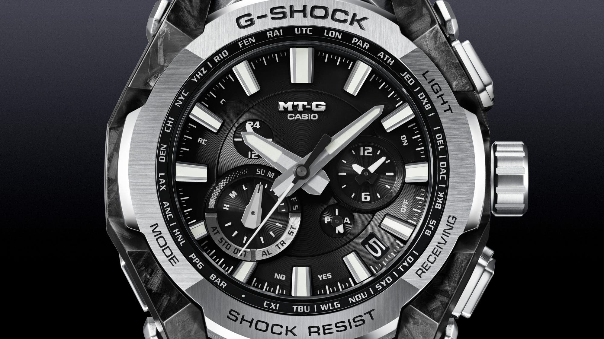 A close-up image clearly showing the intricately detailed dial design with its deep, sculpted features