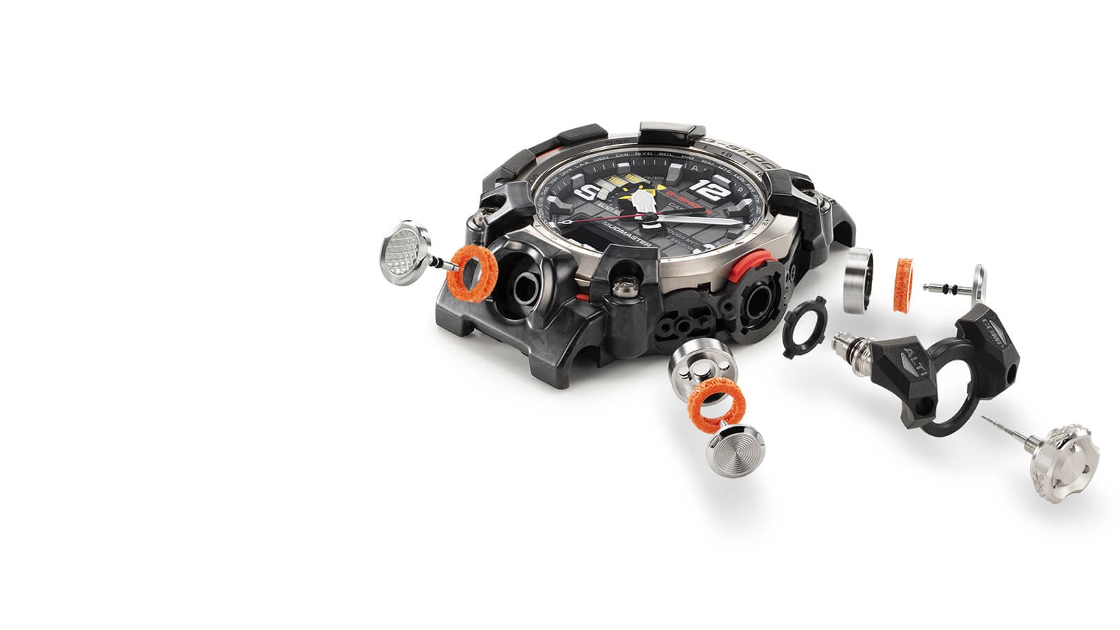 La caja de un reloj Master of G Mudmaster GWG-2000-1A3, rodeada de botones, tubos de botones y topes de silicona